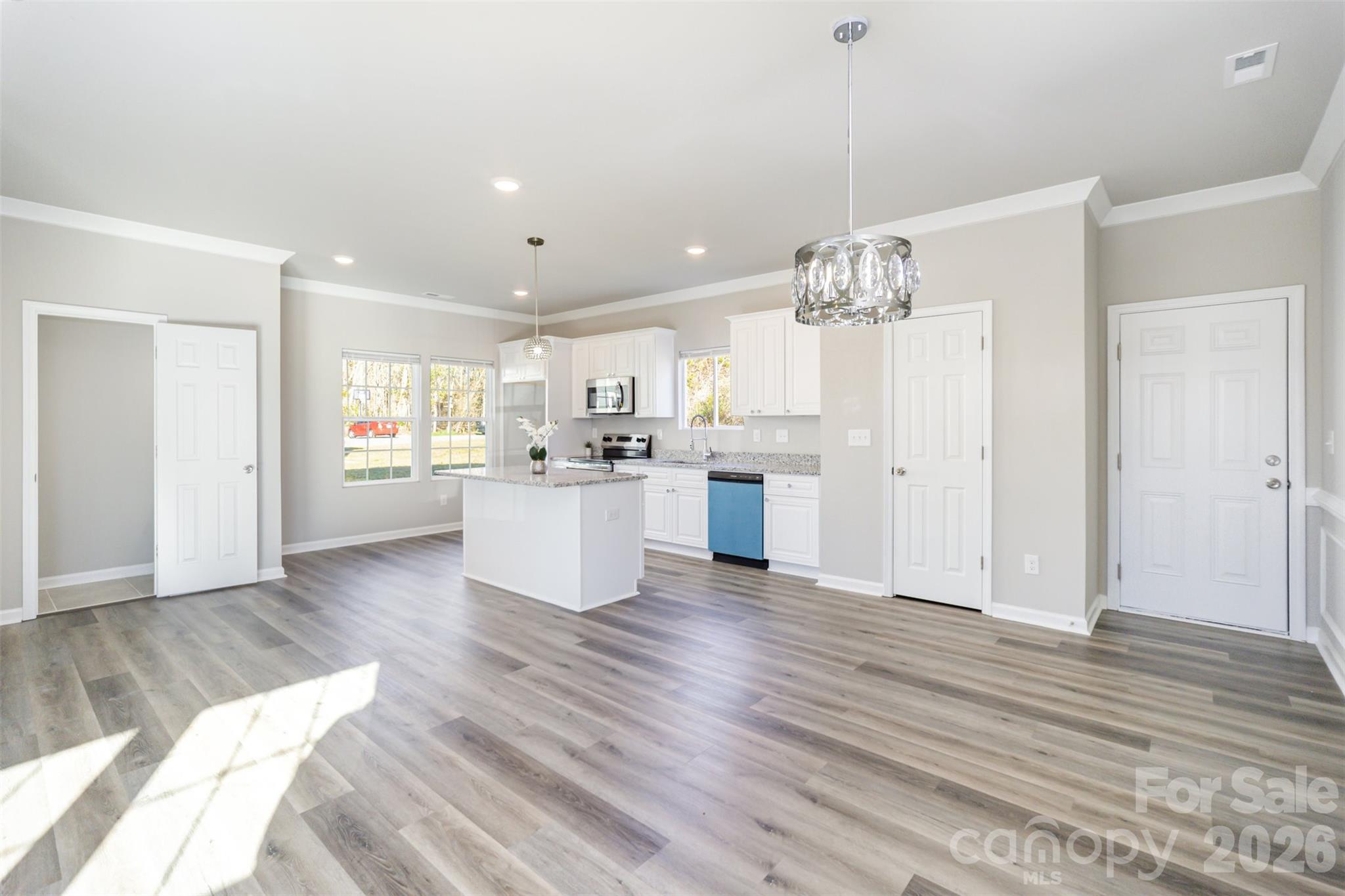 2133 Tom Sadler Road Charlotte, NC 28214 - Photo 22 of 30 a view of a kitchen with wooden floor