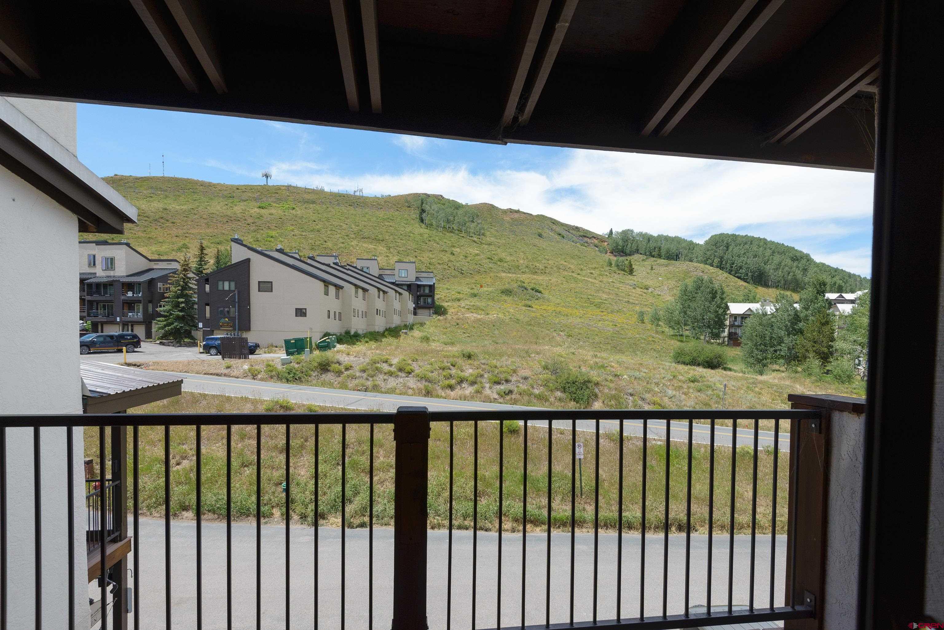 701 Gothic Road, Unit 332 Crested Butte, CO 81225 - Photo 26 of 29 a view of a balcony with an outdoor space