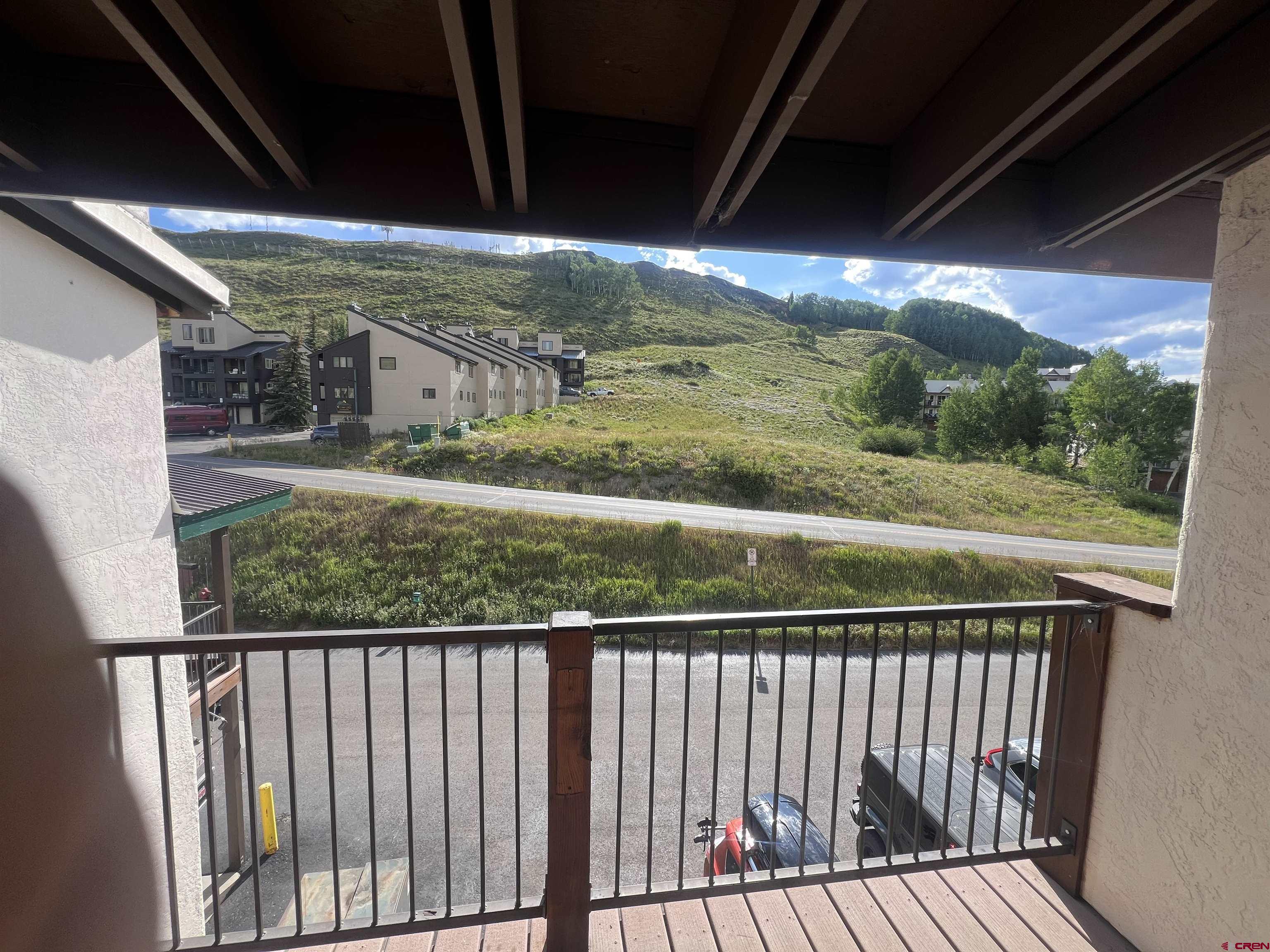 701 Gothic Road, Unit 332 Crested Butte, CO 81225 - Photo 29 of 29 a view of balcony with wooden floor