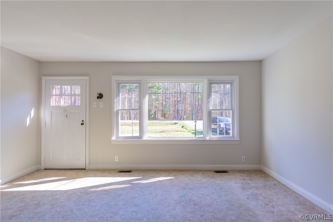 8276 Varina Road Henrico, VA 23231 - Photo 11 of 39 an empty room with windows