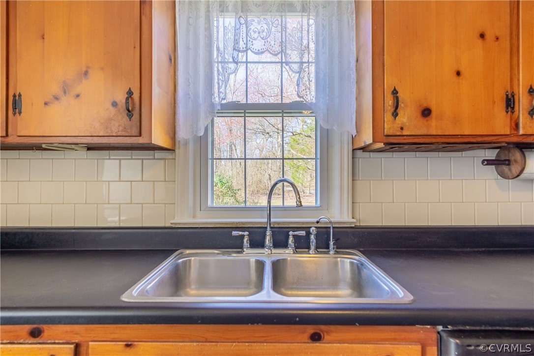 8276 Varina Road Henrico, VA 23231 - Photo 17 of 39 a kitchen with a sink and a window