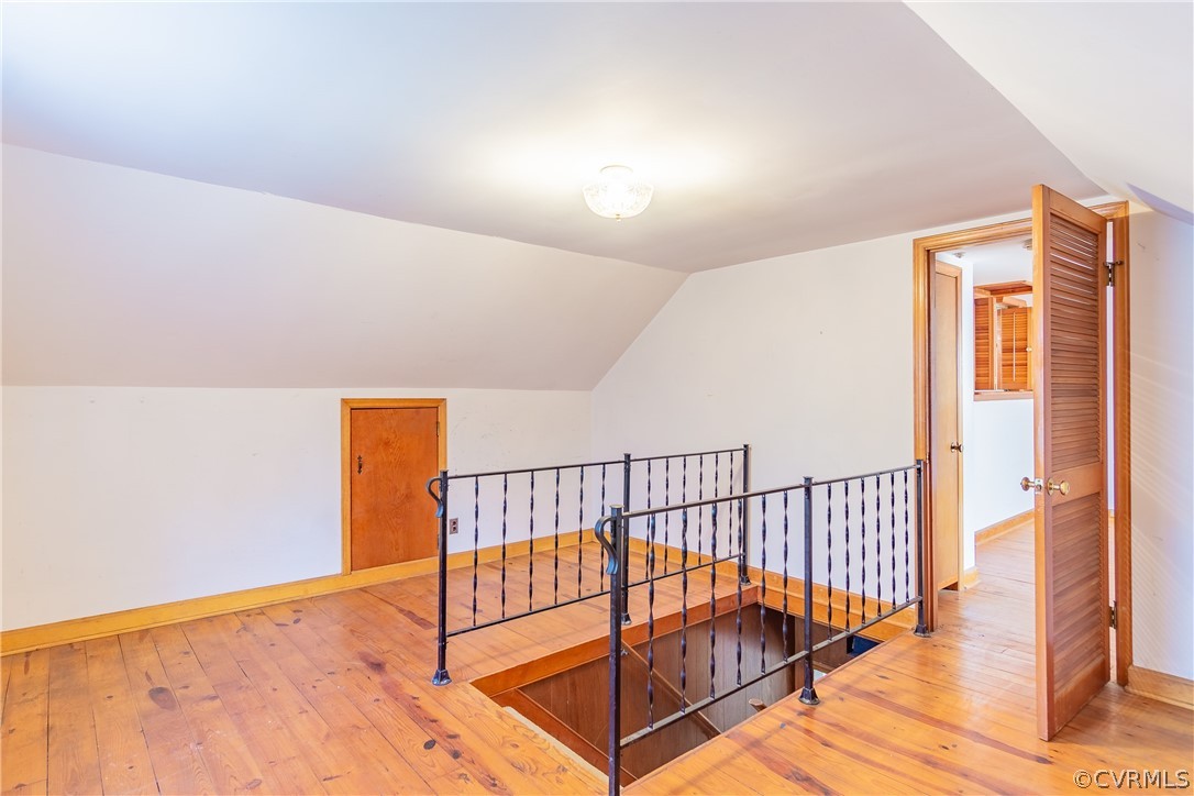8276 Varina Road Henrico, VA 23231 - Photo 24 of 39 a view of a hallway with wooden floor