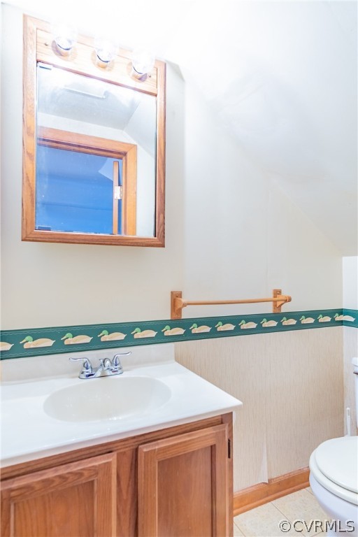 8276 Varina Road Henrico, VA 23231 - Photo 28 of 39 a bathroom with a sink a mirror and a toilet