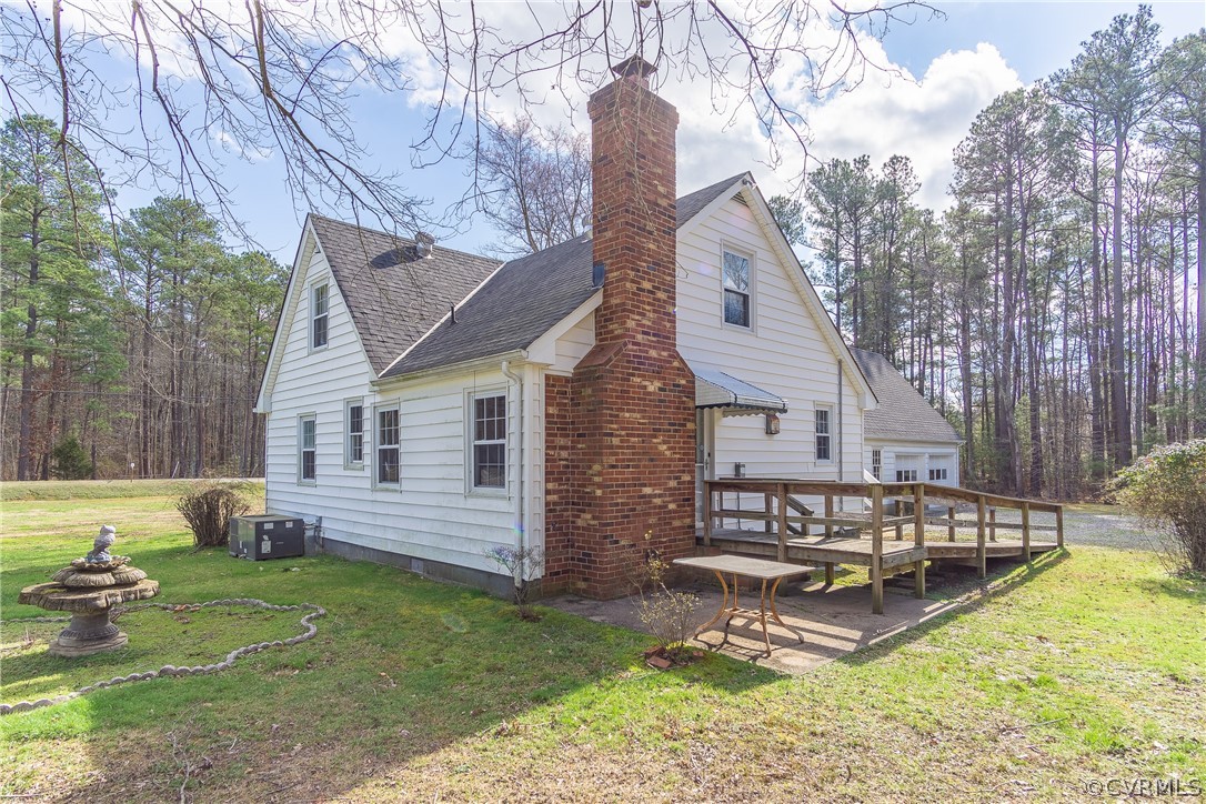 8276 Varina Road Henrico, VA 23231 - Photo 4 of 39 a view of a house with backyard and sitting area