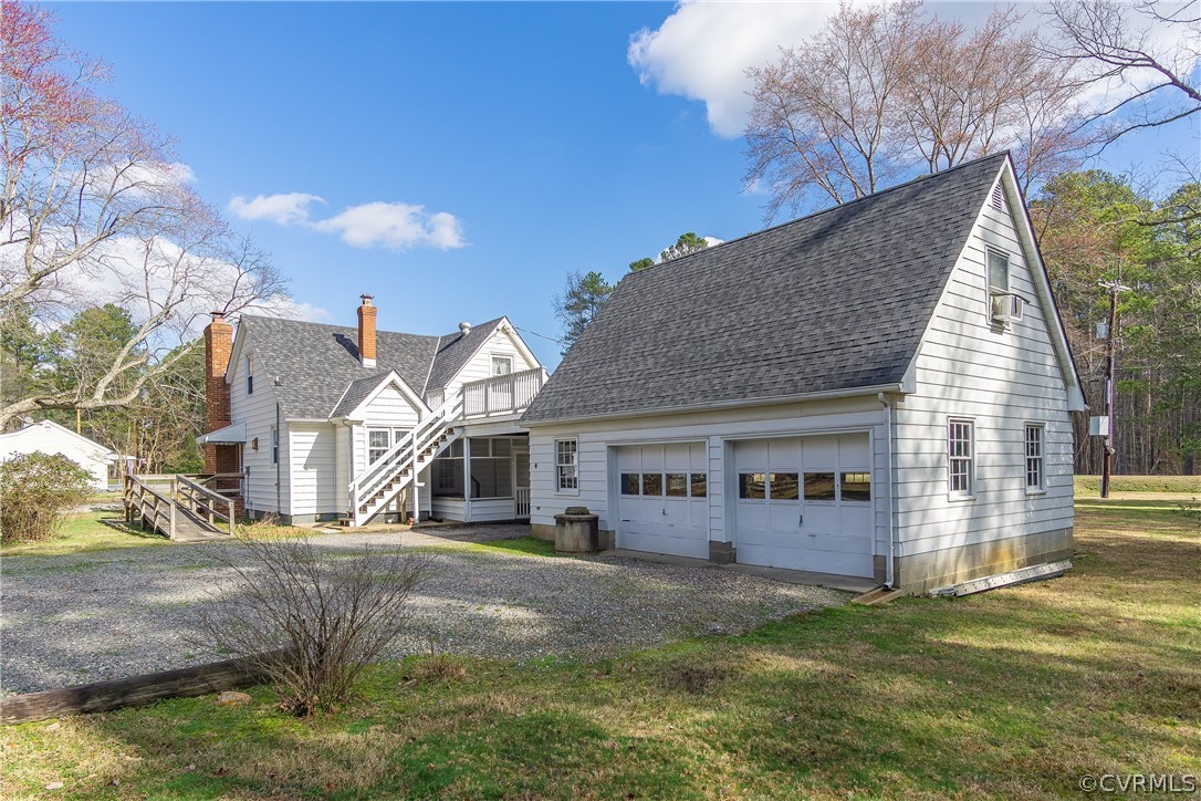 8276 Varina Road Henrico, VA 23231 - Photo 6 of 39 a view of a white house with a yard
