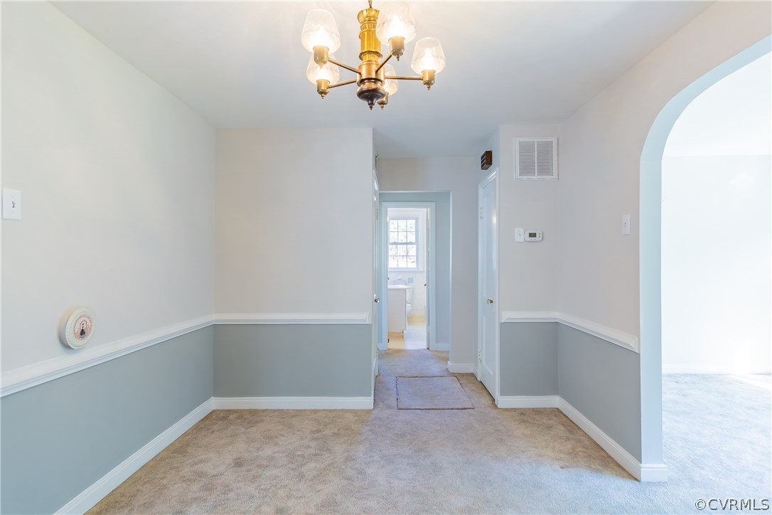 8276 Varina Road Henrico, VA 23231 - Photo 8 of 39 wooden floor in an empty room with a window