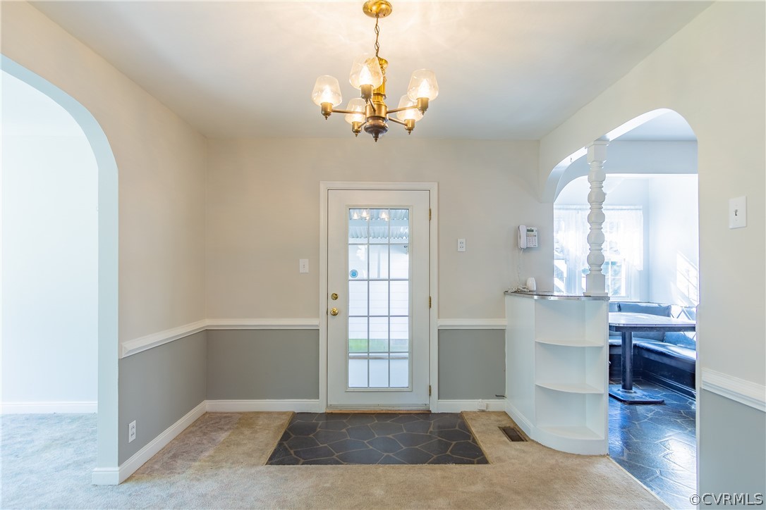 8276 Varina Road Henrico, VA 23231 - Photo 9 of 39 a view of a livingroom with a chandelier furniture and windows