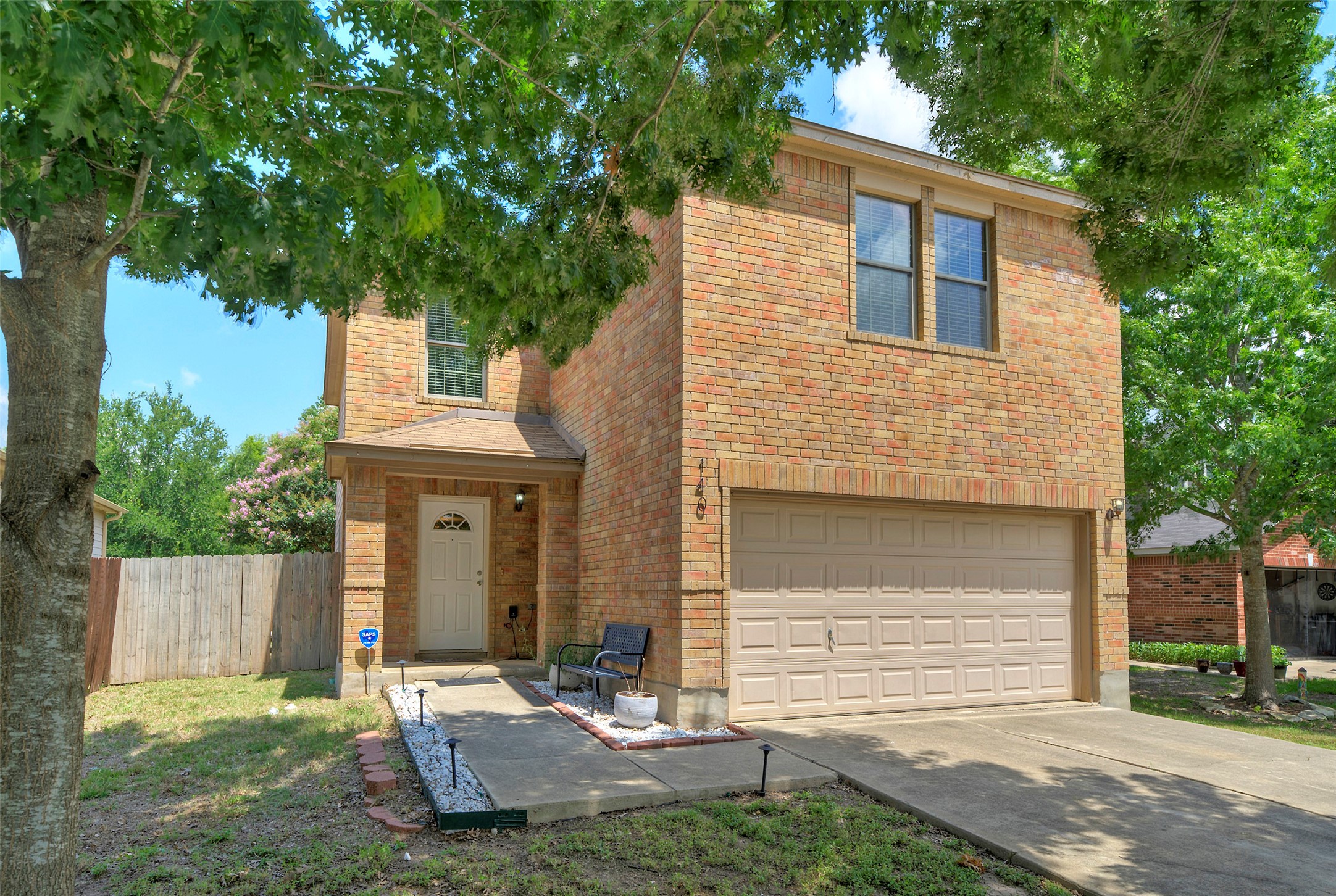 140 Plum Path Kyle, TX 78640 - Photo 2 of 22 a front view of a house with a yard