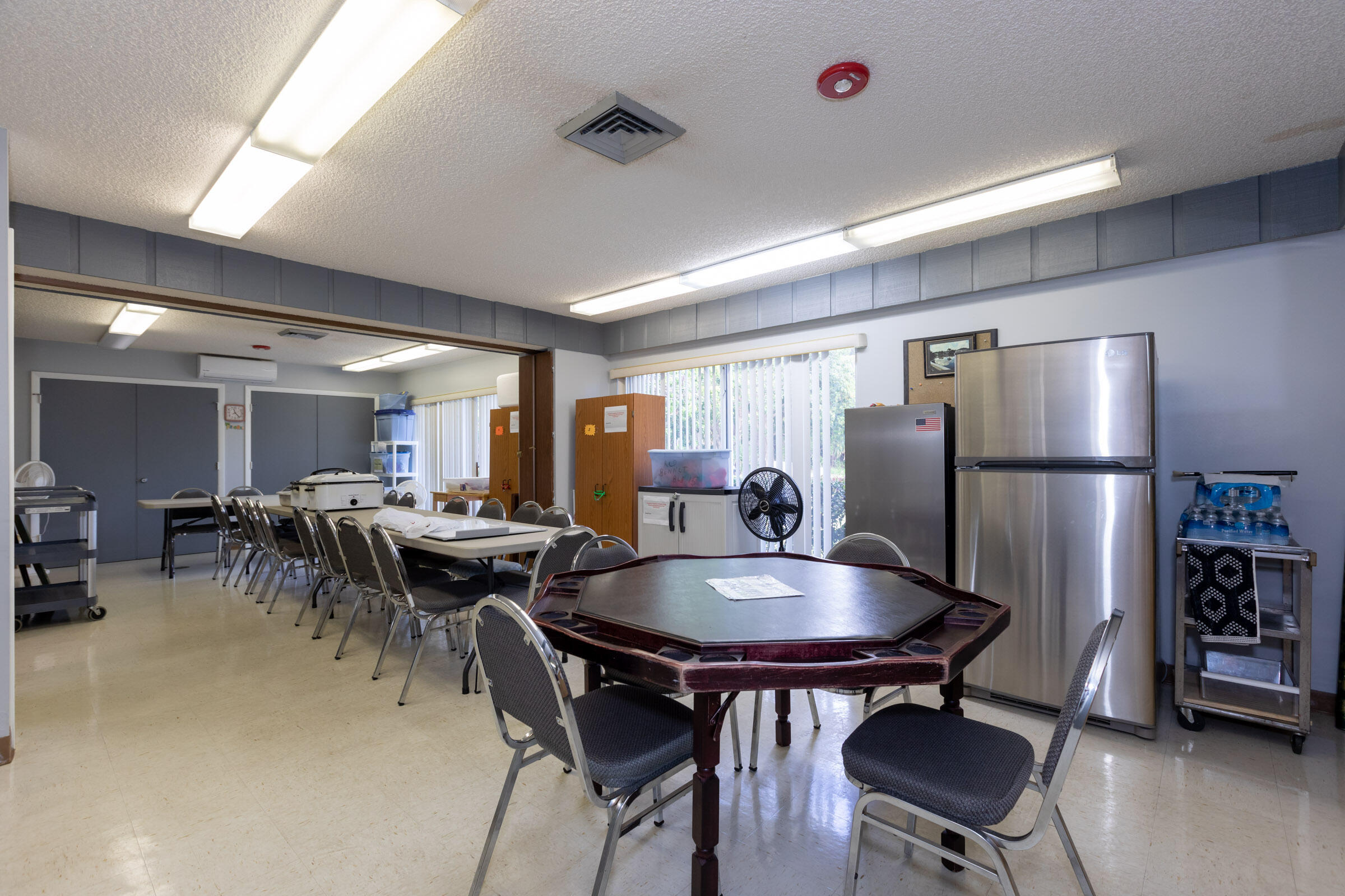 25 Lake Vista Trail, Unit 203 Port St. Lucie, FL 34952 - Photo 27 of 36 a view of a dining room with furniture