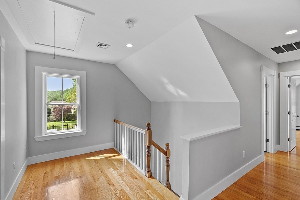 21 Cottage Street Hamilton, MA 01982 - Photo 18 of 40 a view of an entryway with wooden floor