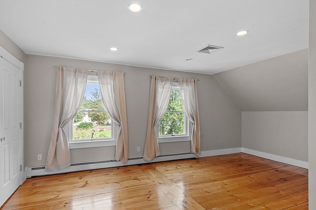 21 Cottage Street Hamilton, MA 01982 - Photo 22 of 40 an empty room with wooden floor and windows