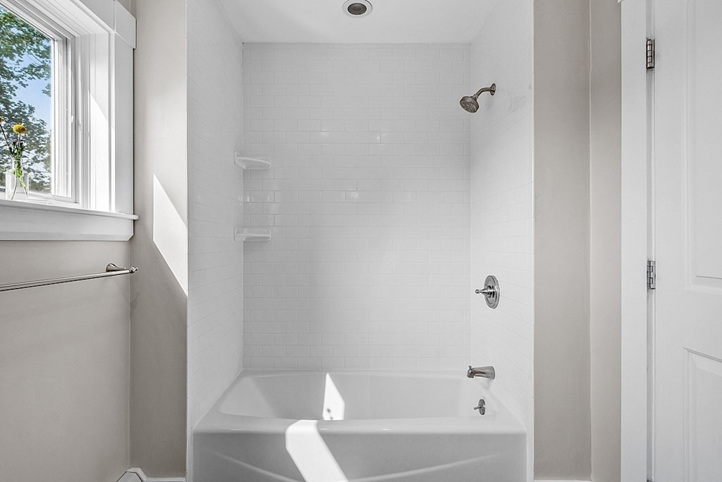 21 Cottage Street Hamilton, MA 01982 - Photo 26 of 40 a bathroom with a bathtub