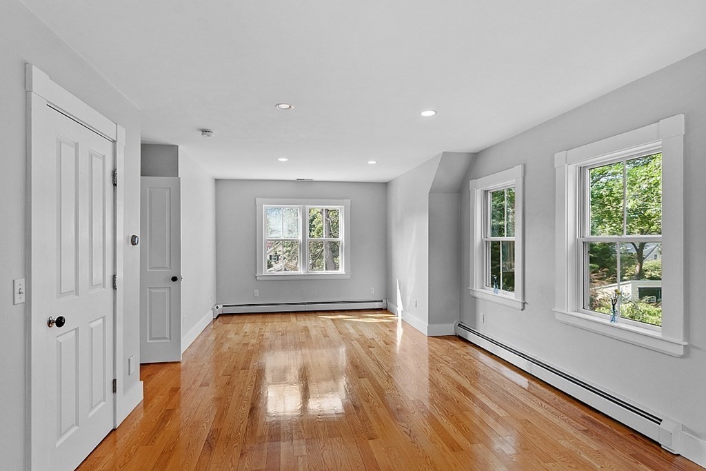 21 Cottage Street Hamilton, MA 01982 - Photo 28 of 40 a view of empty room with wooden floor and fan