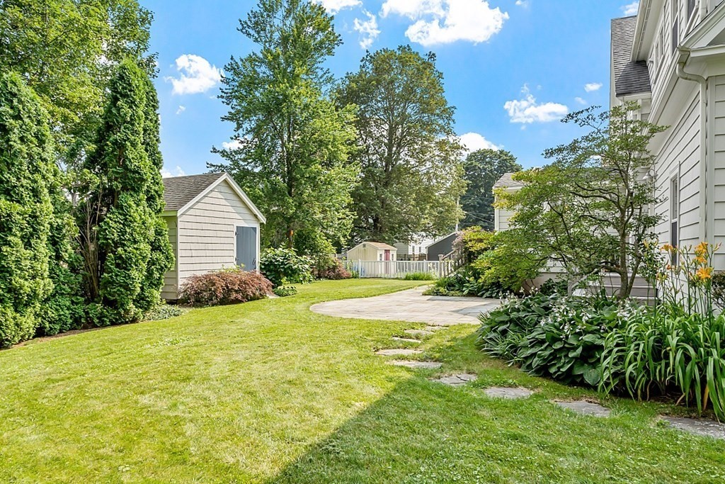 21 Cottage Street Hamilton, MA 01982 - Photo 34 of 40 a view of a house with pool and garden