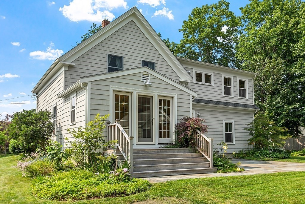 21 Cottage Street Hamilton, MA 01982 - Photo 36 of 40 a front view of a house with garden