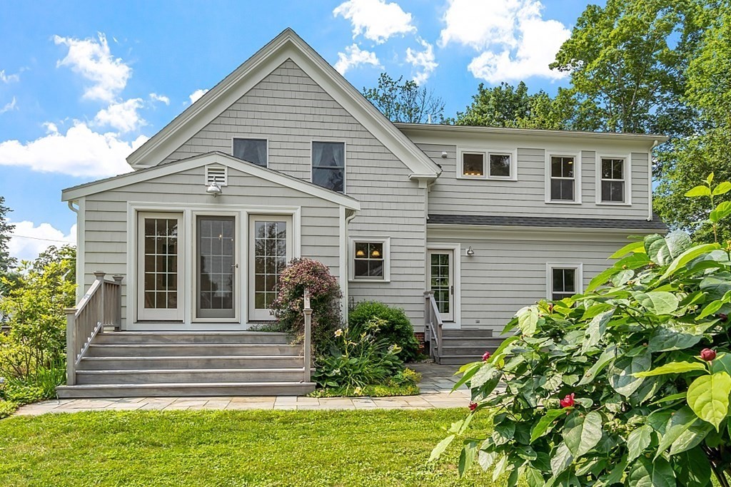 21 Cottage Street Hamilton, MA 01982 - Photo 37 of 40 a front view of a house with a yard