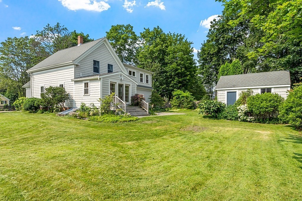 21 Cottage Street Hamilton, MA 01982 - Photo 38 of 40 a front view of a house with garden