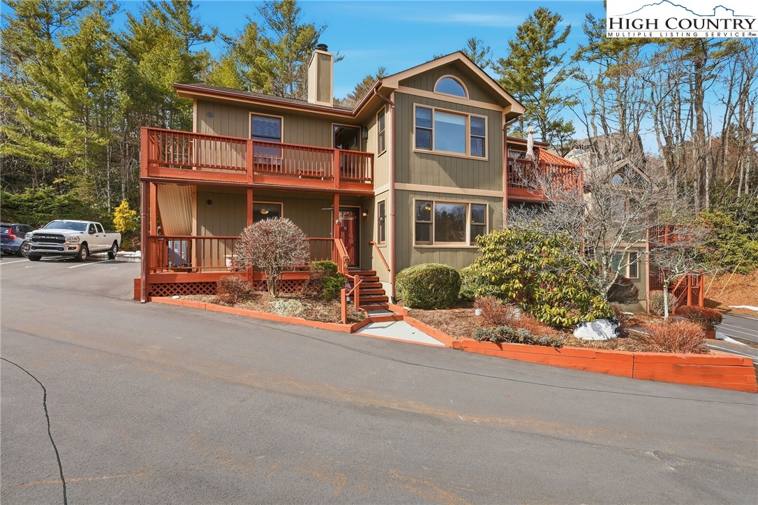 155 Glen Burney Road, Unit C4 Blowing Rock, NC 28605 - Photo 1 of 15 front view of a house with a street