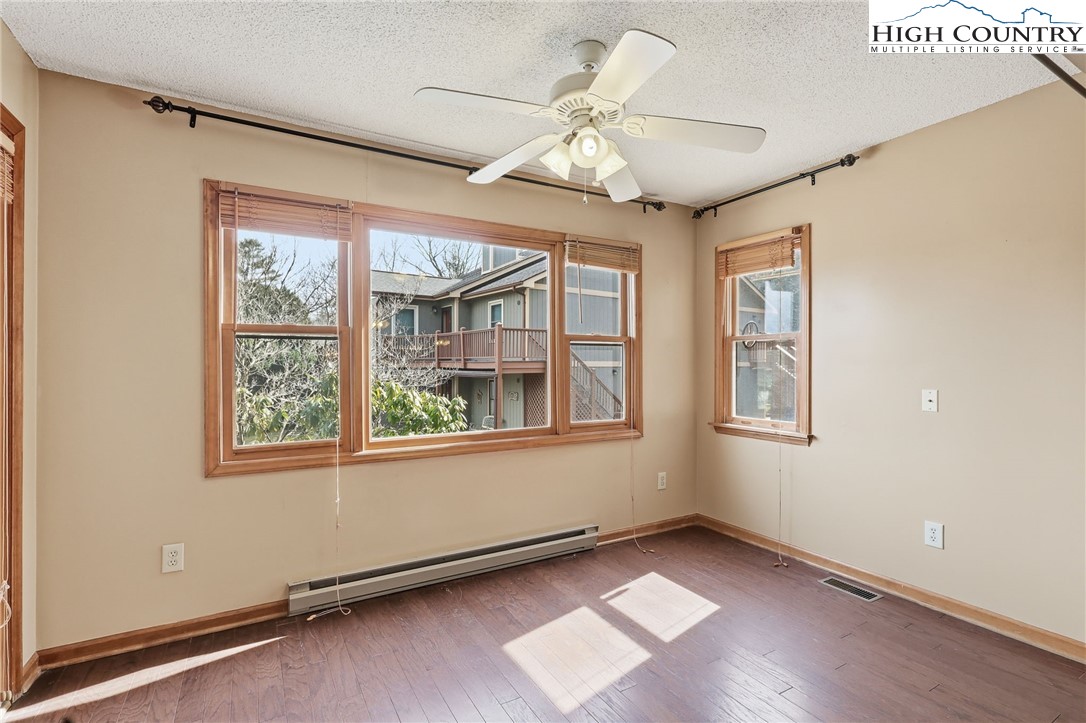 155 Glen Burney Road, Unit C4 Blowing Rock, NC 28605 - Photo 5 of 15 a view of an empty room with a window
