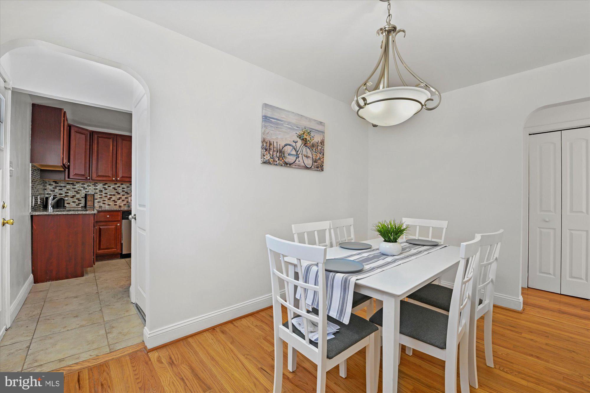 125 Allgate Road Owings Mills, MD 21117 - Photo 11 of 28 Dining Room with hardwood flooring