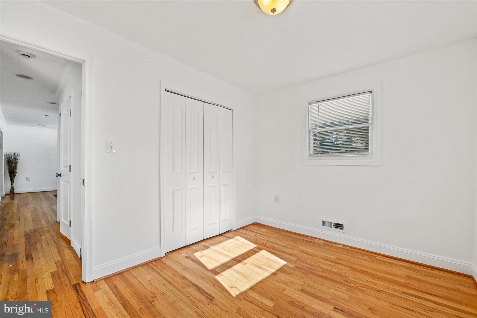 125 Allgate Road Owings Mills, MD 21117 - Photo 16 of 28 Bedroom 3 with hardwood flooring