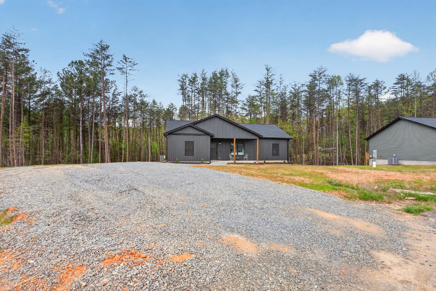 162 Dillon Cabin Road Moneta, VA 24121 - Photo 39 of 56 a house with trees in the background