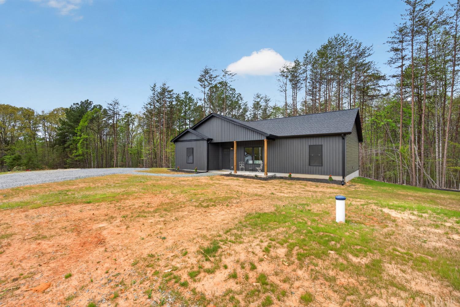 162 Dillon Cabin Road Moneta, VA 24121 - Photo 40 of 56 a view of a house with a swimming pool and a yard