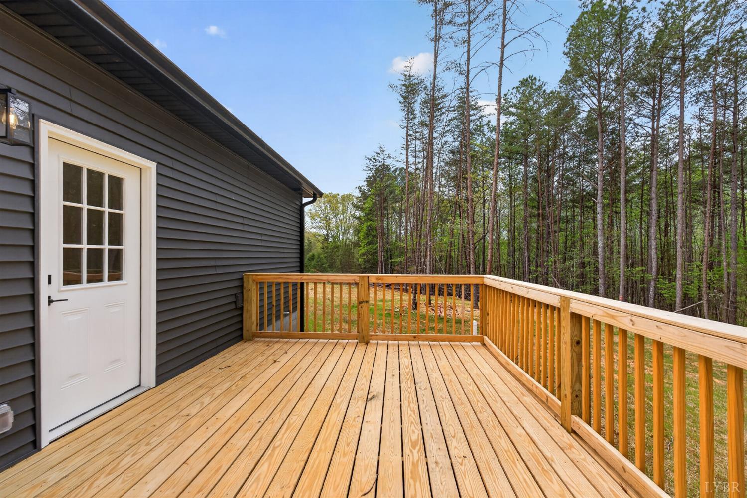 162 Dillon Cabin Road Moneta, VA 24121 - Photo 49 of 56 a view of balcony with wooden floor and fence