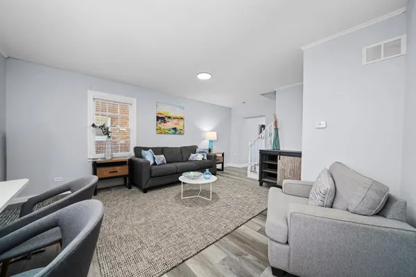 a living room with furniture and a couch
