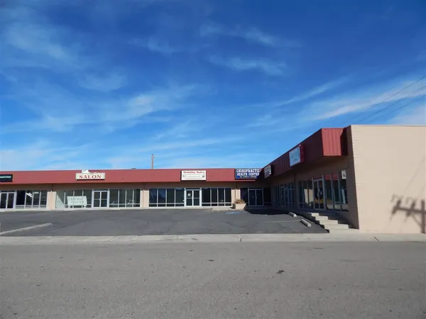 a view of houses with a street