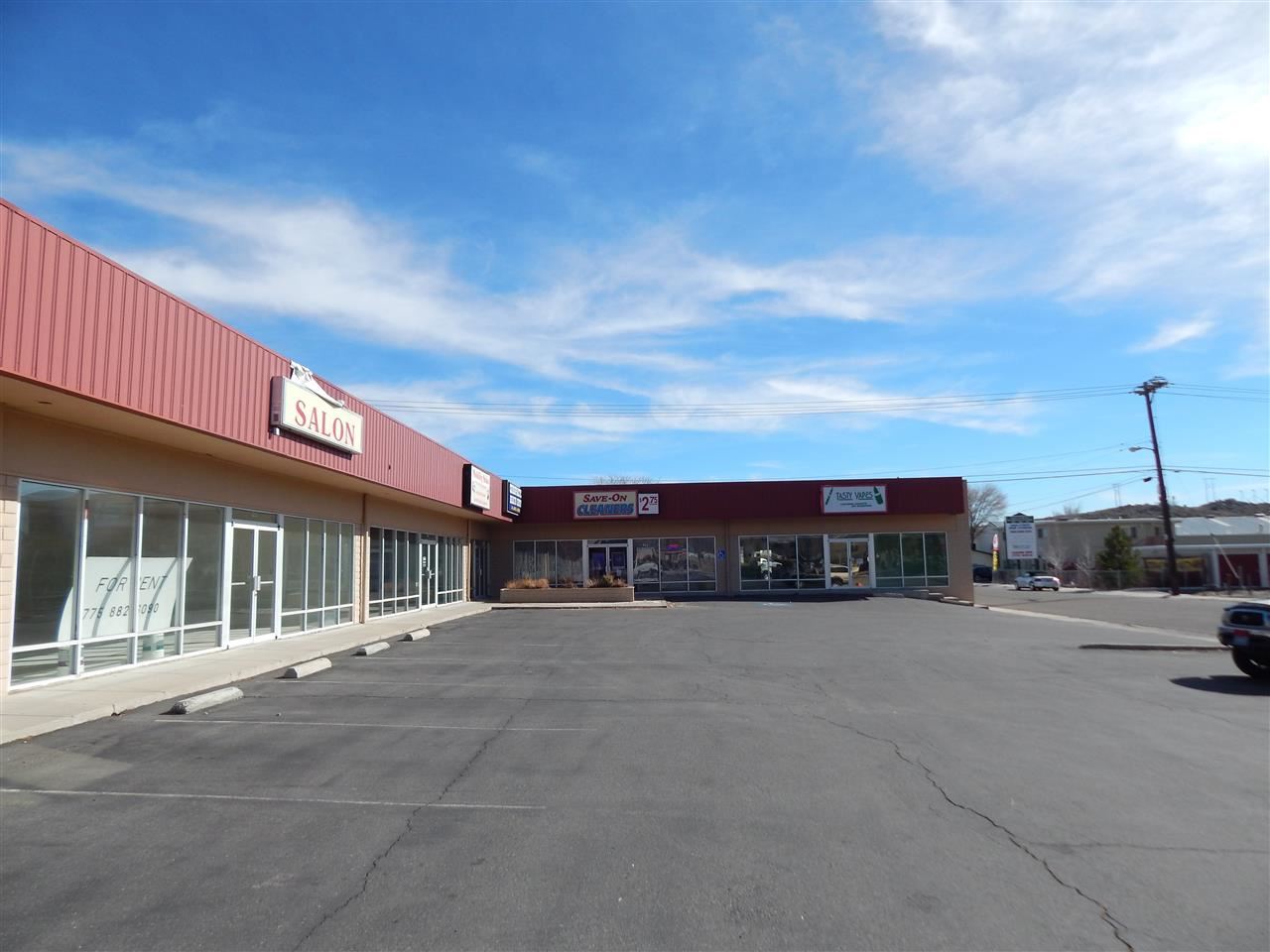 101 Hot Springs Road, Unit 7 Carson City, NV 89706 - Photo 6 of 14 a view of a building with car parked