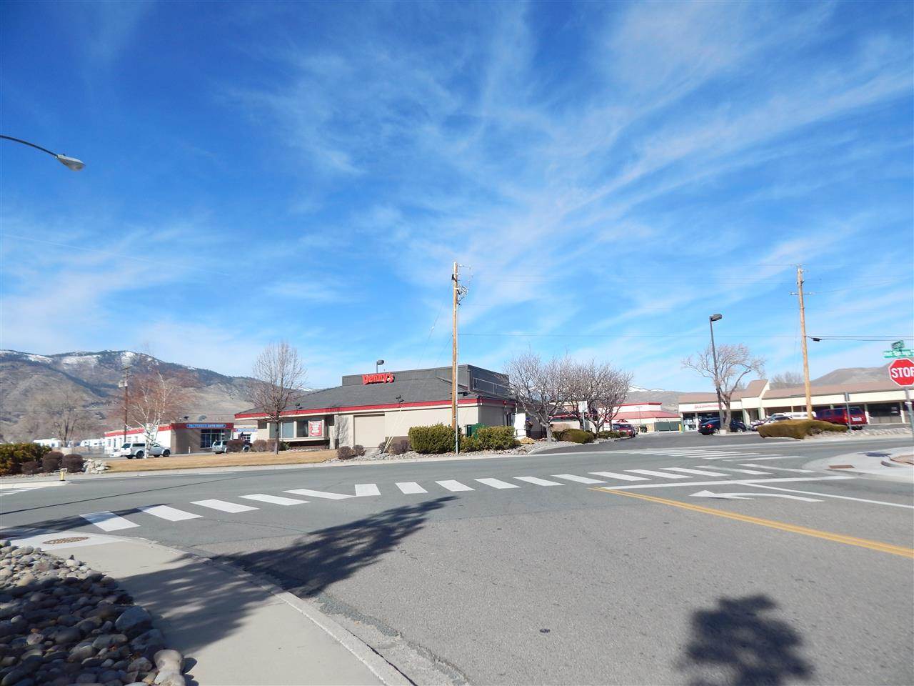 101 Hot Springs Road, Unit 7 Carson City, NV 89706 - Photo 7 of 14 a city street with a building in the background