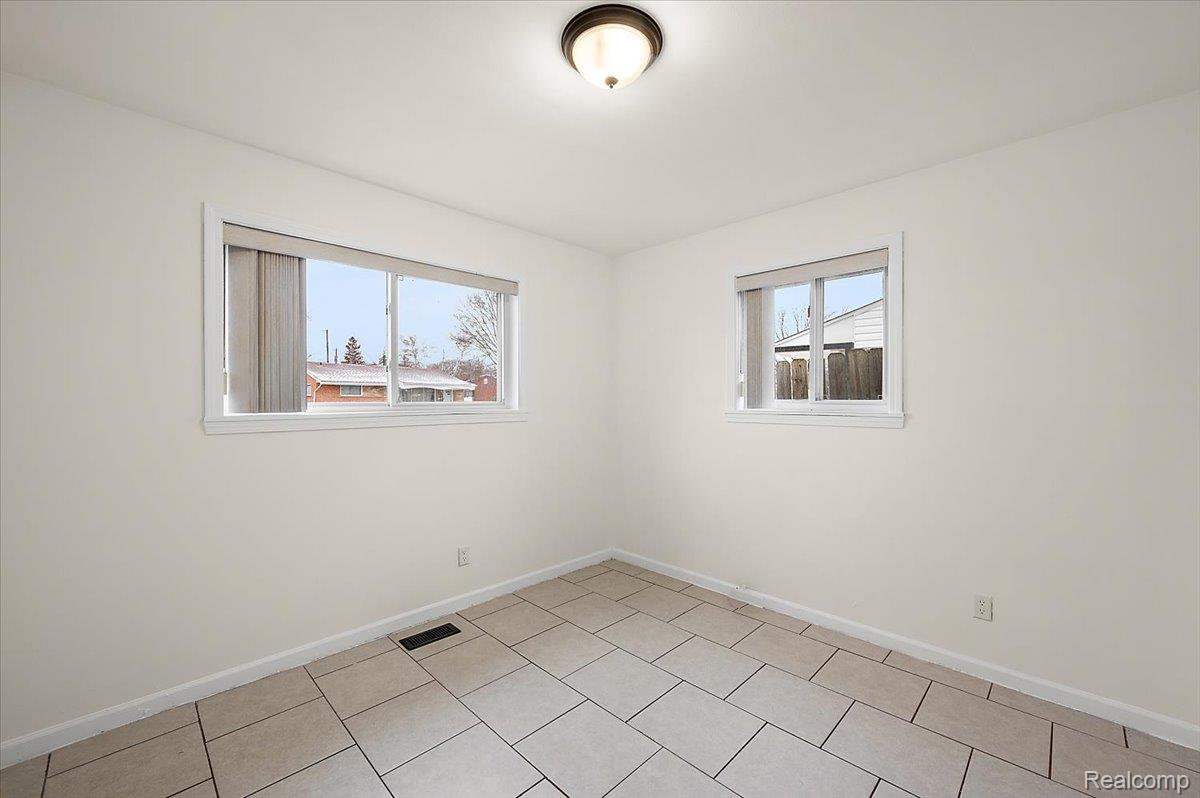 32416 Exeter Drive Warren, MI 48092 - Photo 21 of 33 Spare room featuring baseboards