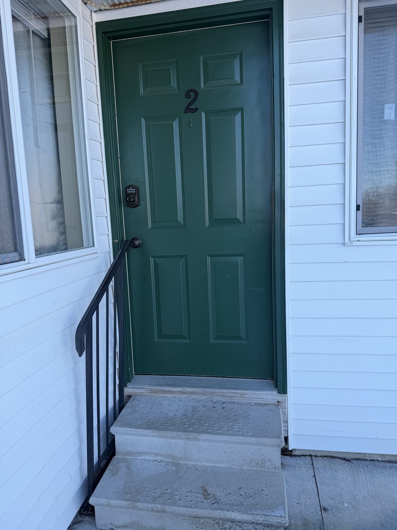25731 West Bridge Street, Unit 2 Channahon, IL 60410 - Photo 1 of 9 a view of a entryway door