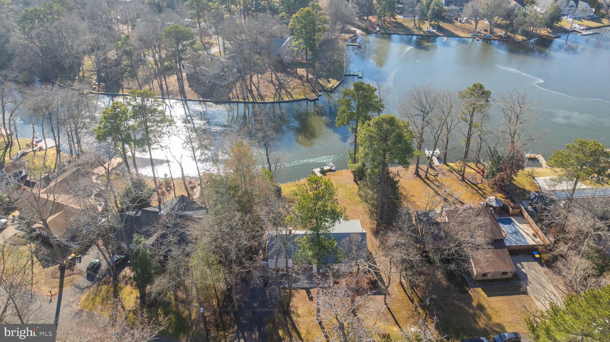 31394 Point Circle Lewes, DE 19958 - Photo 23 of 29 Surrounded by mature woodlands and nature!
