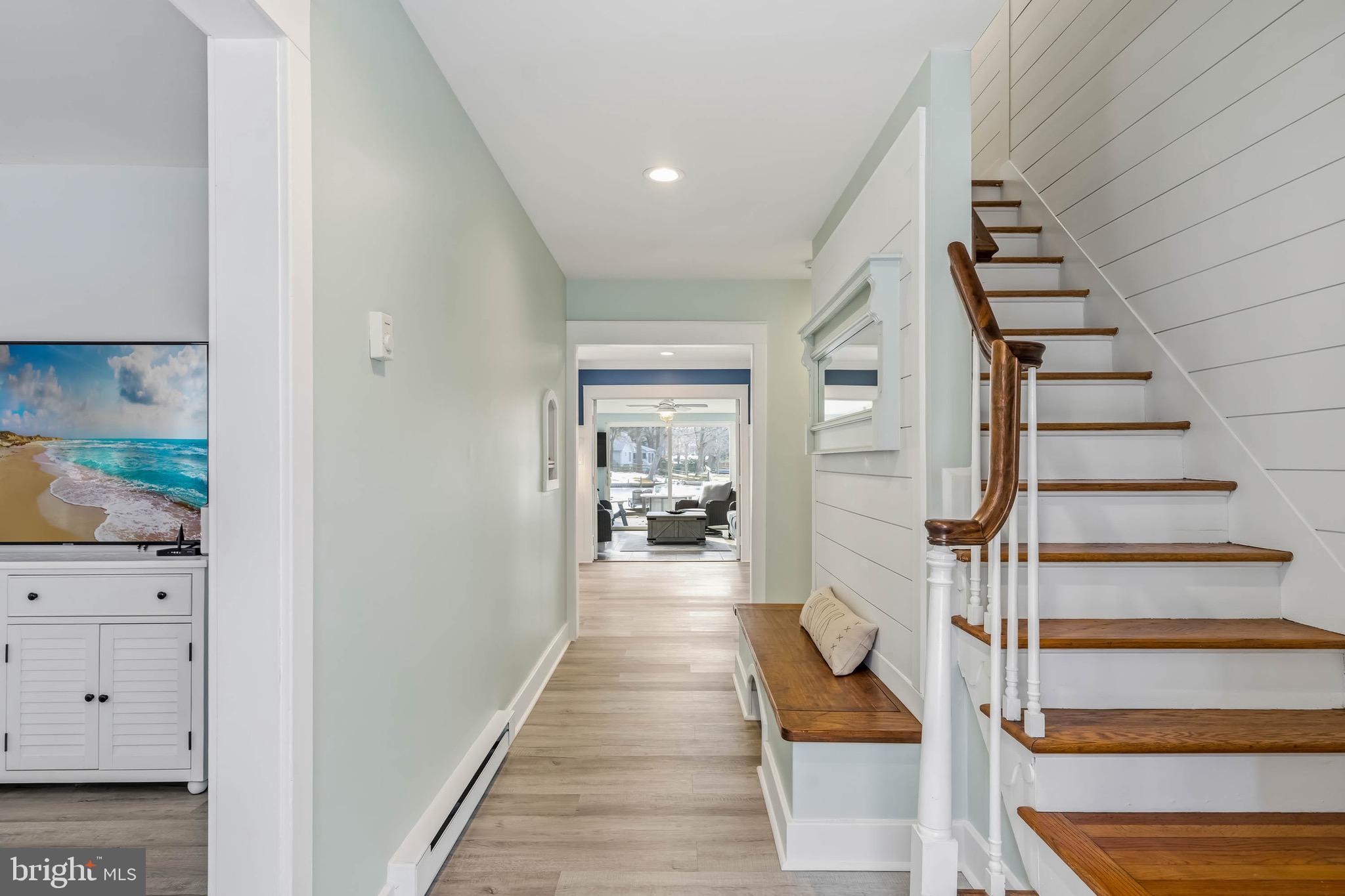 31394 Point Circle Lewes, DE 19958 - Photo 31 of 79 a hallway with white walls and stairs