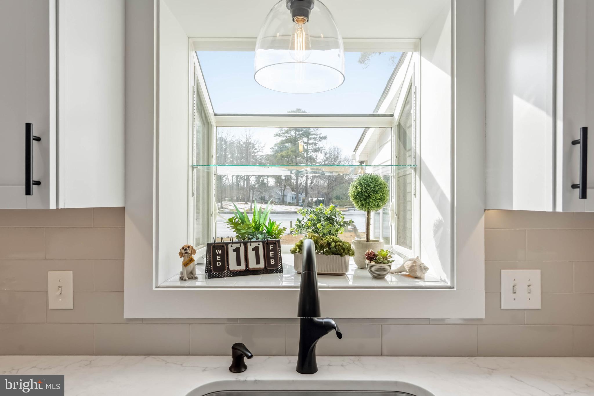 31394 Point Circle Lewes, DE 19958 - Photo 38 of 79 a view of living room filled with furniture and a window