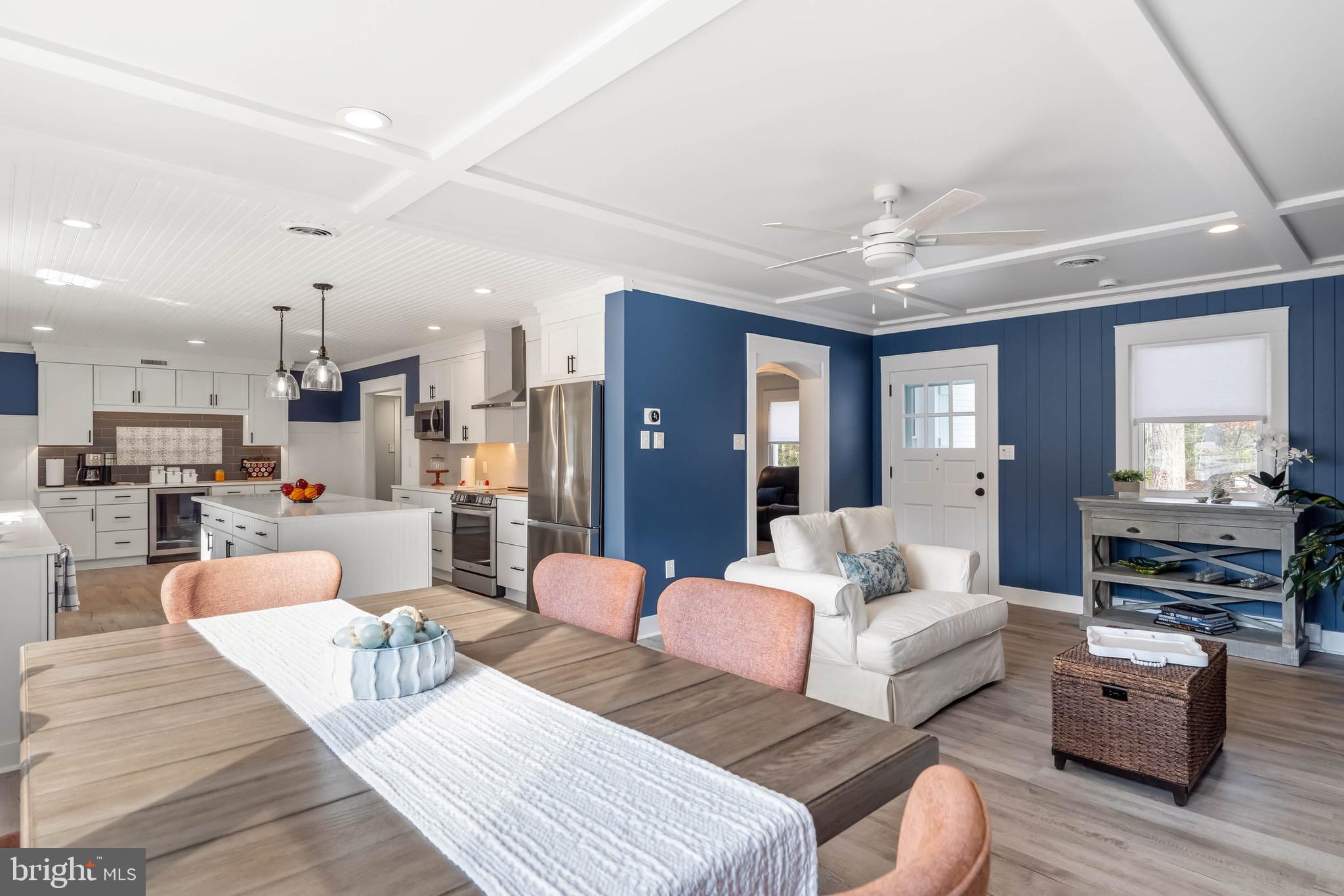 31394 Point Circle Lewes, DE 19958 - Photo 48 of 79 a living room with furniture and kitchen view