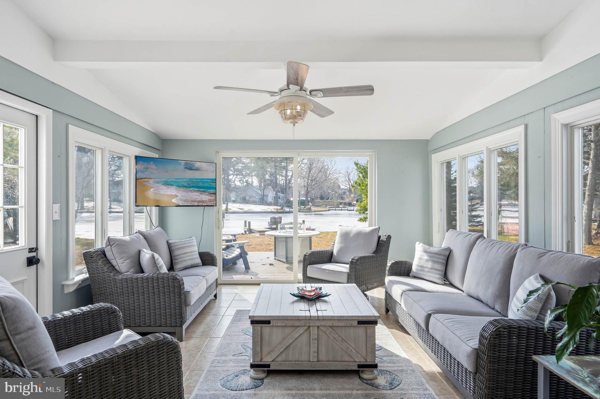 31394 Point Circle Lewes, DE 19958 - Photo 55 of 79 a living room with furniture and a large window