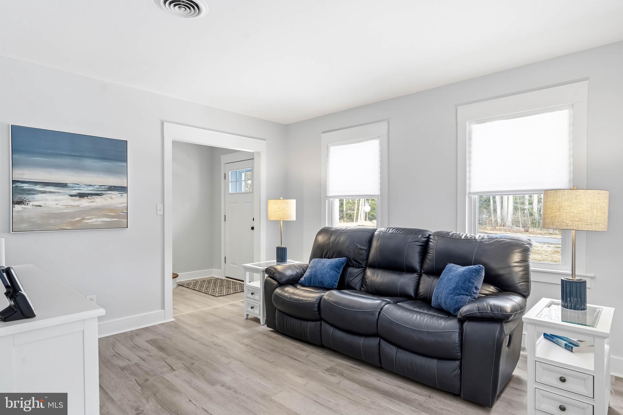 31394 Point Circle Lewes, DE 19958 - Photo 58 of 79 a living room with furniture and a window