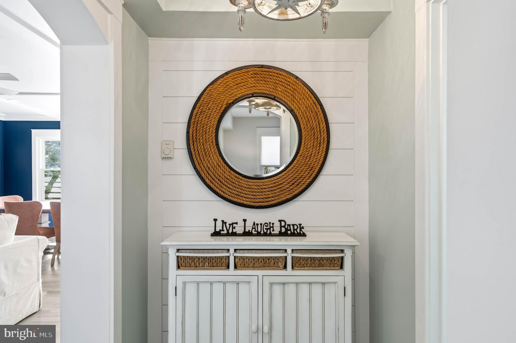 31394 Point Circle Lewes, DE 19958 - Photo 59 of 79 a bathroom with a sink and a mirror