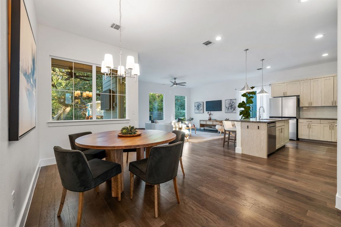 7906 Ryans Way Austin, TX 78726 - Photo 10 of 32 The dining area is conveniently located off the kitchen with views to the green backyard.