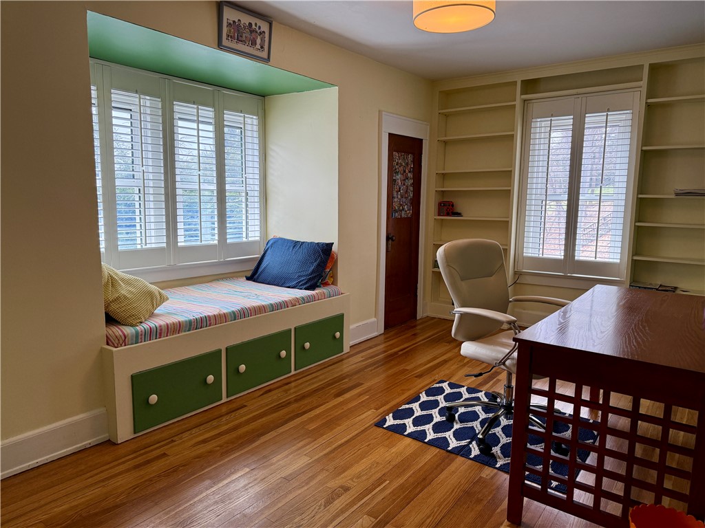 11 Cedar Street Oneonta, NY 13820 - Photo 18 of 42 3rd Bedroom with Built in bookcases and window sea