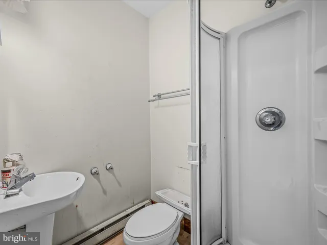 a view of a house with a yard and garage