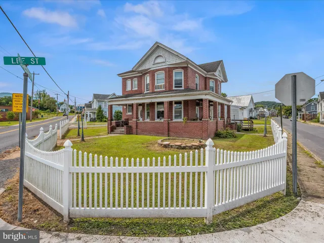 an aerial view of a house with a garden