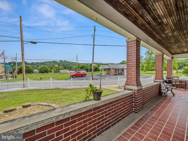 a porch with seating space