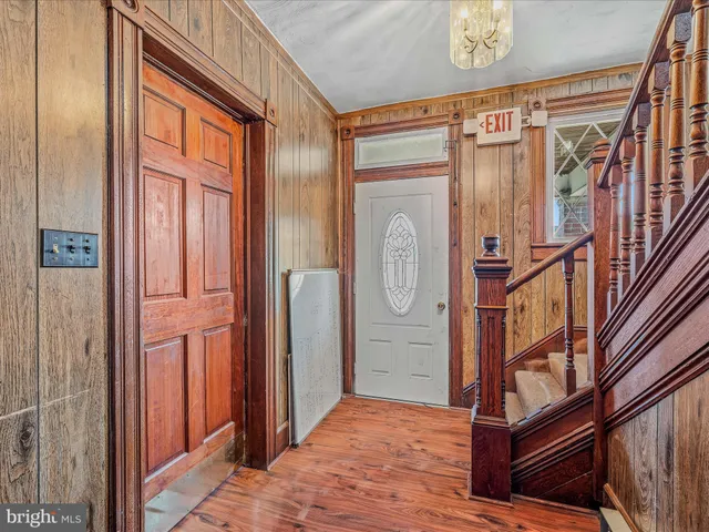 a bathroom with a sink a toilet and a shower