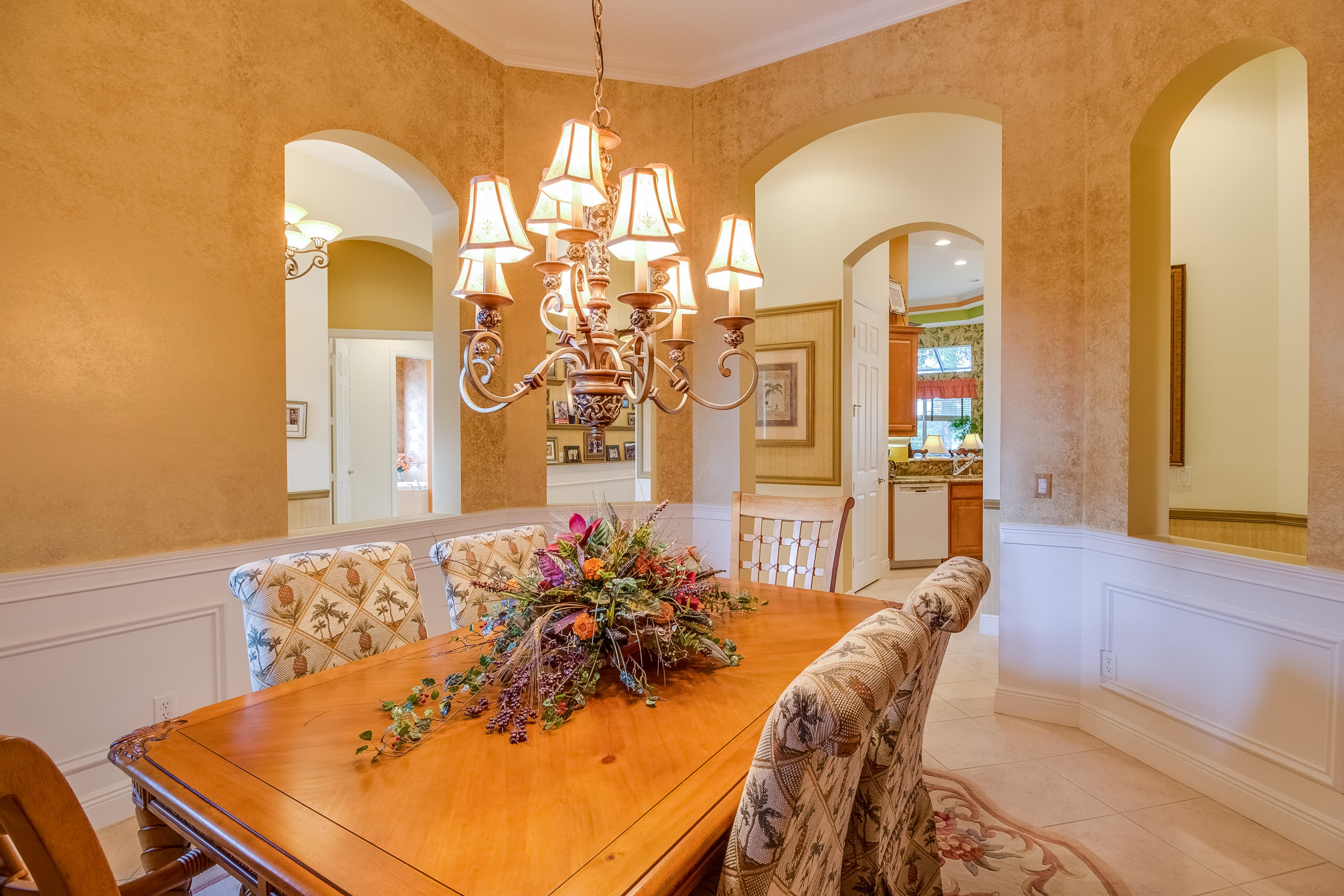 8617 Tompson Point Road Port St. Lucie, FL 34986 - Photo 10 of 38 a view of a dining room with furniture