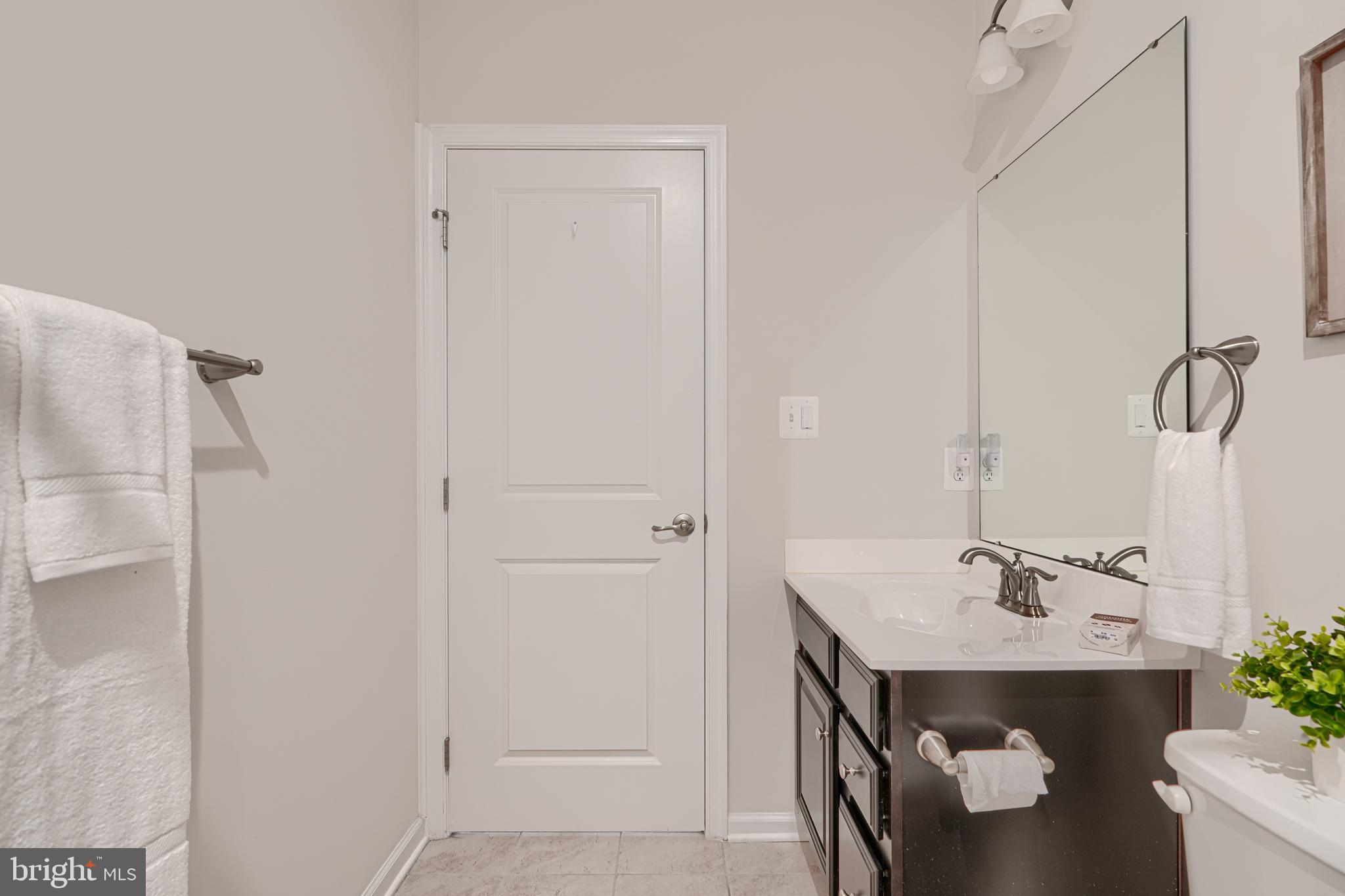 2824 Shaws Road Sparrows Point, MD 21219 - Photo 38 of 61 a bathroom with a sink toilet and shower