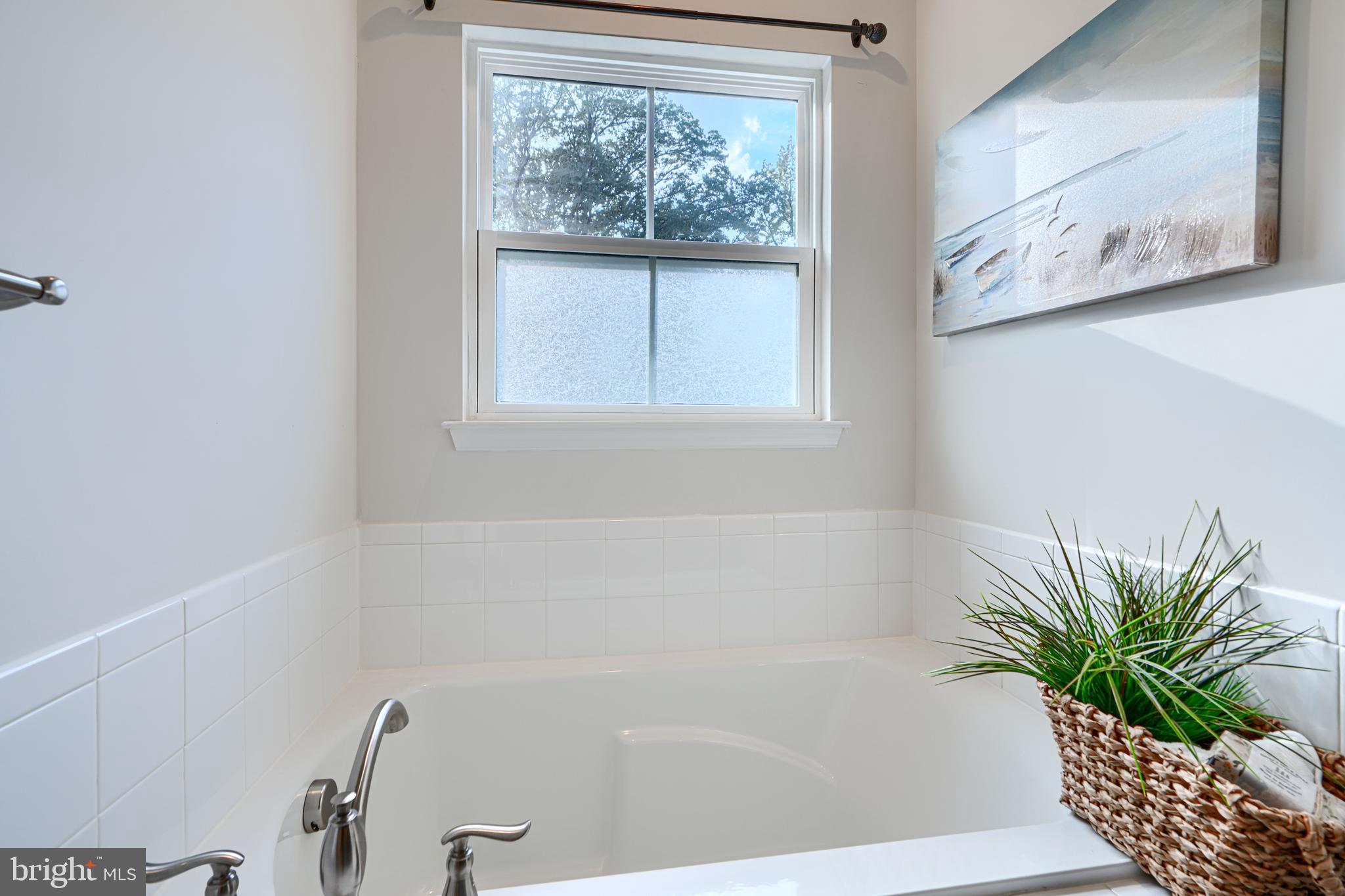 2824 Shaws Road Sparrows Point, MD 21219 - Photo 45 of 61 a bath tub sitting next to a window